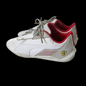 Photo of Puma Ferrari R-Cat Men’s Size 8 white and red racing shoes featuring low-profile design, gold-tone lace tips, and Ferrari shield logo.